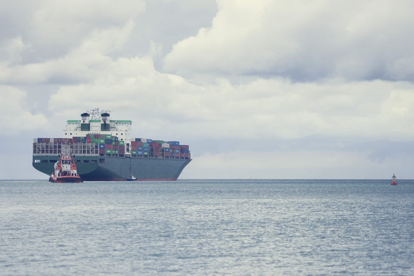 Container ship carrying freight across an ocean trade lane